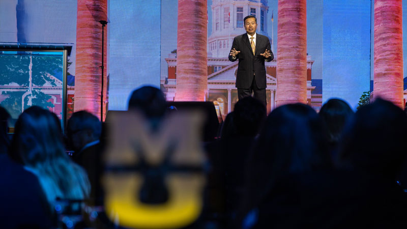 University of Missouri Presidenty Mun Y. Choi speaks to a crowded room of supporters at an event celebrating the announcement of Power the Roar.