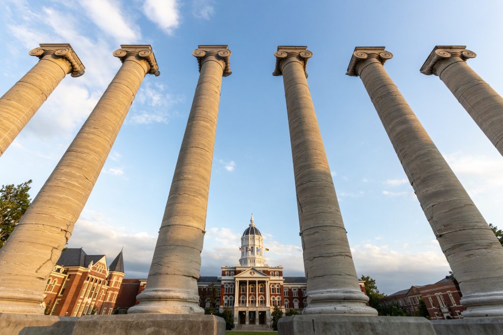 A view of Jesse Hall through the Columns