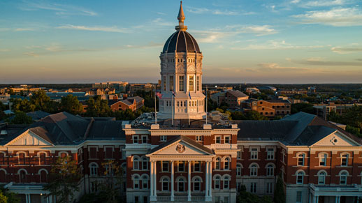 An aerial view of the dome of Jesse Hall with the University of Missouri campus in the background