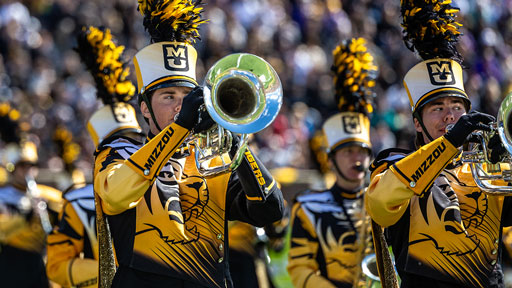 A Marching Mizzou bandmember performss during halftime during a Mizzou football game at Memorial Stadium.